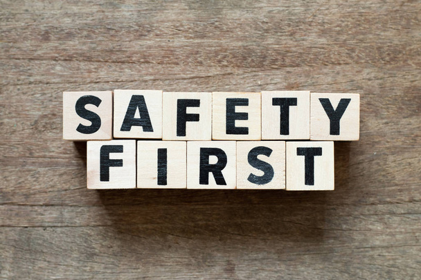 Letter block in word safety first on wood background - Foto, Imagen