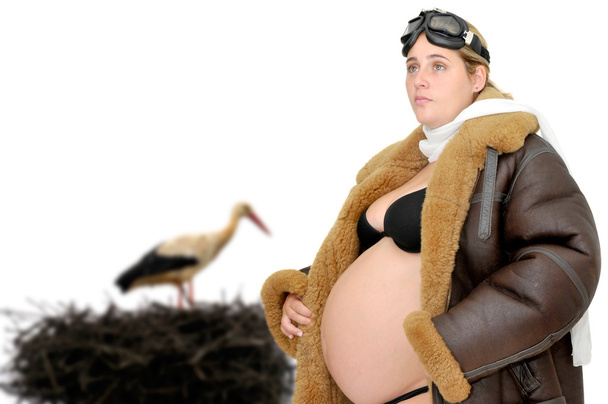 Pregnant woman and stork - Photo, Image