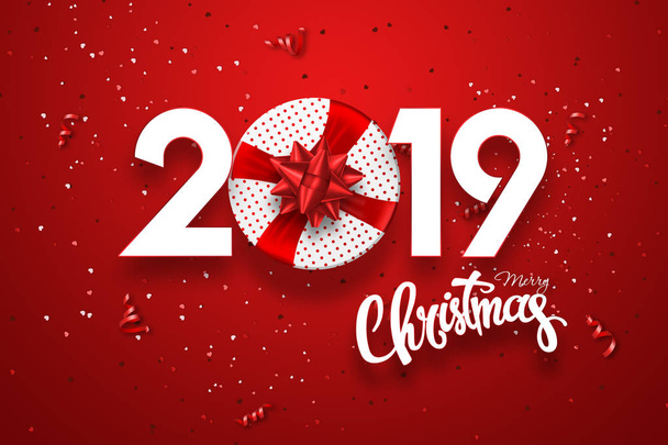 Creative background, numbers 2019 and festive confetti, spiral ribbons on a red background. Happy New Year 2019. Decoration element with tinsel, copy space. - Fotografie, Obrázek