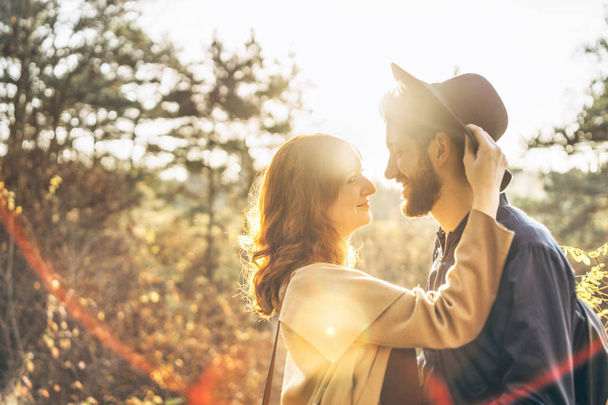 Happy young romantic couple spend time together outdoor - Фото, изображение