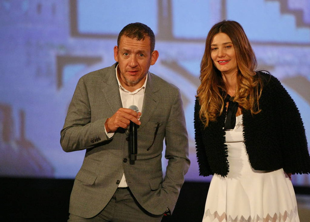 French director and actor Dany Boon, left, and actress Alice Pol attend the opening ceremony for the 14th "Fenetre Sur Le Cinema Francais" to promote their movie "Raid dingue" during the 7th Beijing International Film Festival in Beijing, China, 15 A - Foto, afbeelding