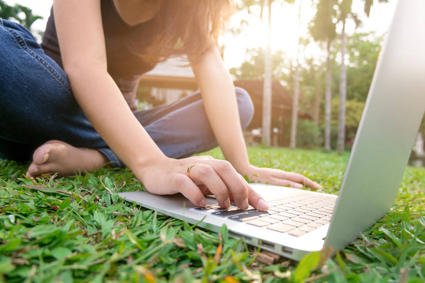young woman using laptop at a outdoors - Foto, Imagen