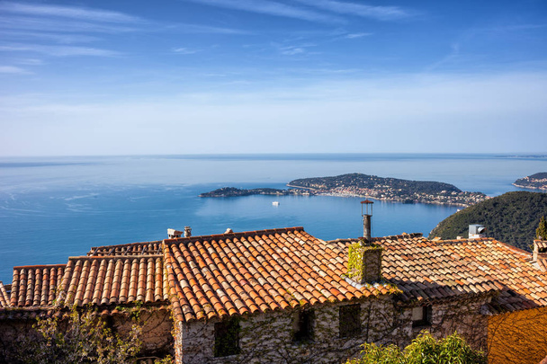 Eze village houses on mountain top at Mediterranean Sea in France, French Riviera, Provence-Alpes-Cote d'Azur region. - 写真・画像