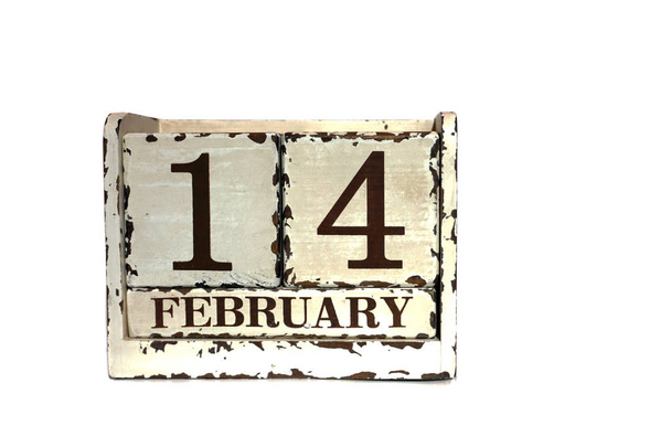 Κύβος ημερολόγιο για τις 14 Φεβρουαρίου σε απομονωμένες φόντο με κενό αντίγραφο χώρο για επιγραφή ή άλλα αντικείμενα. Φόντο ημέρα του Αγίου Βαλεντίνου. - Φωτογραφία, εικόνα