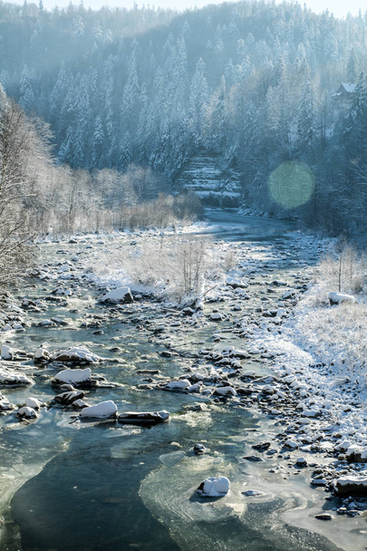 icy riverbed in the winter mountains. mountain river - Photo, Image