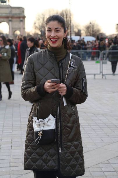 Caroline Issa, fashion director of Tank magazine, attends the Louis Vuitton (LV) Fashion Show during the Paris Fashion Week Fall/Winter 2017 in Paris, France, 7 March 2017. - Foto, Imagem