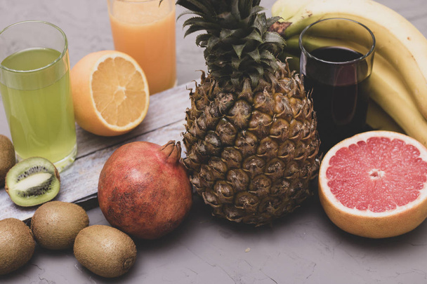 whole pineapple, orange juice, fresh coktails - Photo, Image