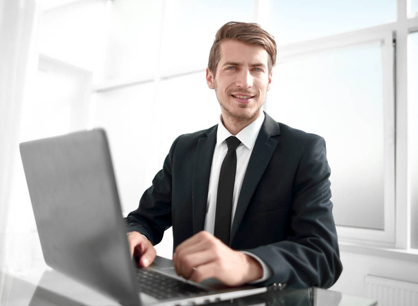 confident businessman sitting at the office Desk. - Photo, Image