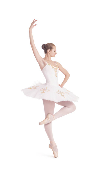 Girl in white tutu dancing ballet. Studio shot on white background , isolated image. - Photo, Image