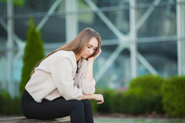 Woman stress. Portrait of bullied girl feeling lonely and worried - Foto, Imagen