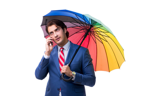 Elegant businessman holding umbrella isolated on white - Photo, Image