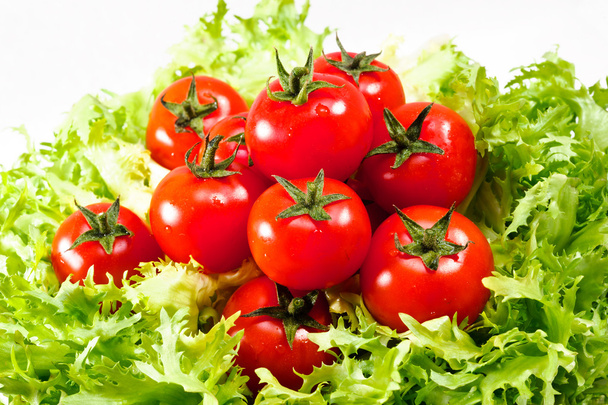 салат зі свіжих салатів зі свіжими помідорами
 - Фото, зображення