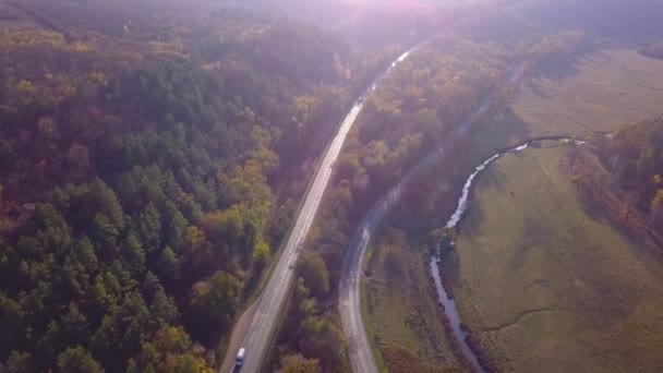 4K aerial view flight over highway. Road vehicles daily traffic cars are moving in both directions view from above - Footage, Video