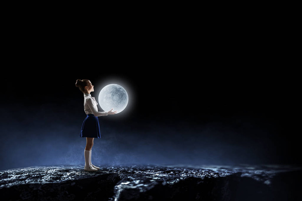 Girl holds the moon . Mixed media - Photo, Image