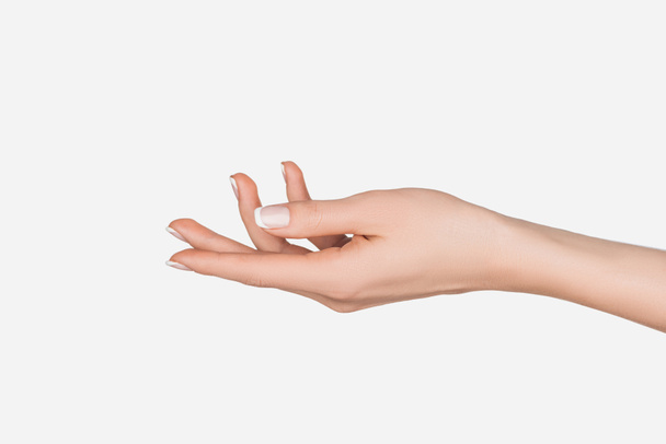 vista parcial de la mano femenina aislada en blanco
 - Foto, Imagen
