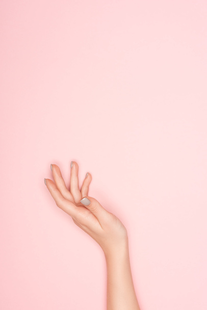 partial view of female hand isolated on pink with copy space - Photo, Image