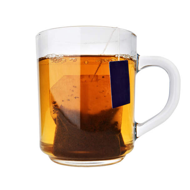 glass cup of tea with packet - Photo, Image