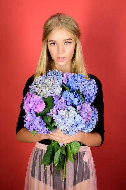 Summer beauty. girl with summer makeup. Makeup cosmetics and skincare. Spring woman with hydrangea flowers. Fashion portrait of woman. Healthy hair and skin. Spring holiday. womens day - Φωτογραφία, εικόνα