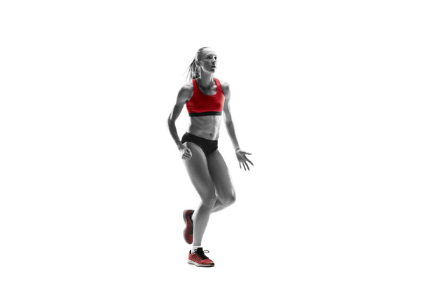 one caucasian woman running on white background - Photo, Image