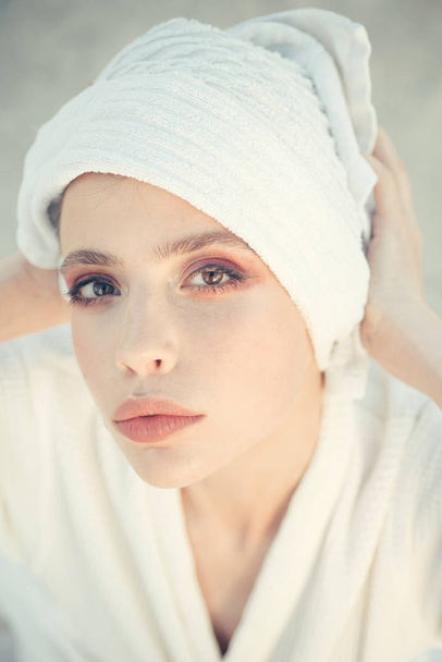 Fresh and pure. Young woman in bathing gown. Beauty routine and hygiene care. Pretty woman wear bath towel on head. Skincare model after spa bath. Skincare at spa. Beauty salon. Bathing habits - Fotoğraf, Görsel