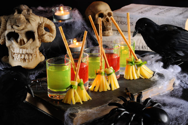 Witch broom made of cheese and bread straw. The original idea of serving snacks to drinks. - Фото, зображення