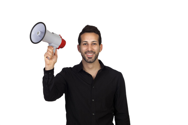 Young businessman with a Megaphone proclaiming something - Photo, Image