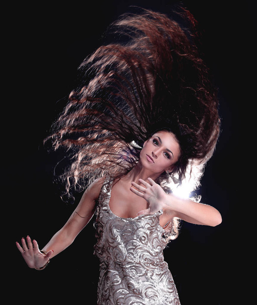 Portrait of a young girl dancing with long dark hair - Fotoğraf, Görsel