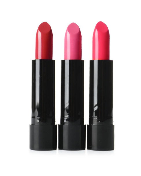 Lipsticks of different shades on white background - Φωτογραφία, εικόνα