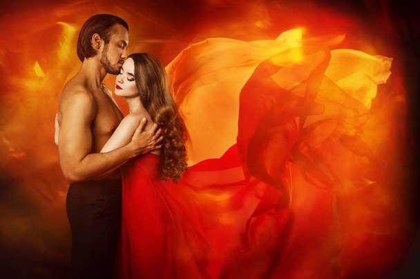 Couple Beauty Portrait, Kissing Man in Love and Seductive Dreaming Woman in Waving Fantasy Dress - Фото, изображение