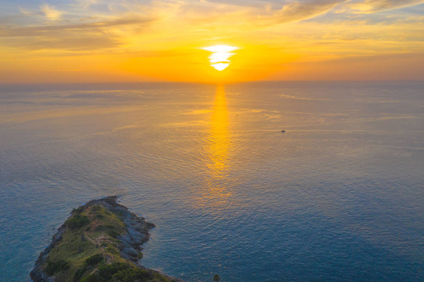 aerial photography sunset above the great lighthouse at Promthep cape Phuket Thailand - Foto, Imagen