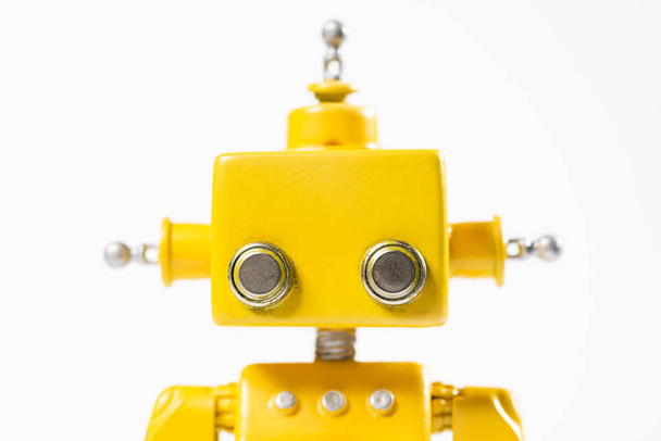 Portrait of a Cute, yellow, handmade robot on a white background. - Foto, Imagem