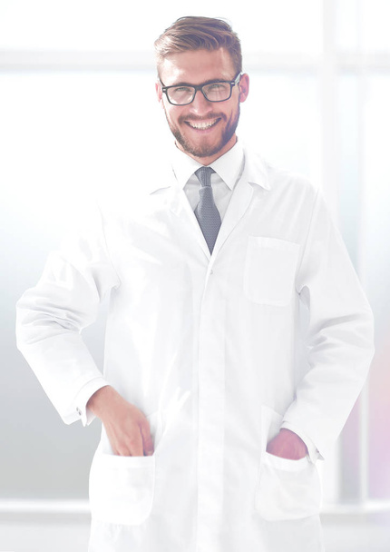 portrait of smiling doctor standing in hospital - Fotó, kép