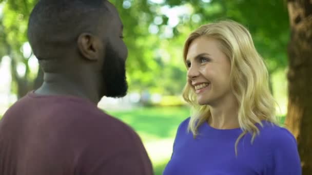 Female emotionally hugs interracial boyfriend, long lasting love relationship - Footage, Video