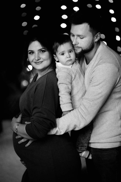 Happy young family posing  at home  - Foto, Bild