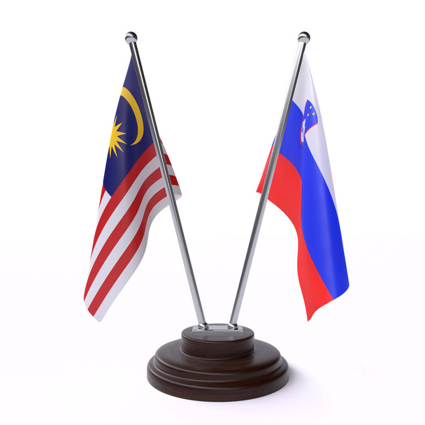 Malaysia and Slovenia, two table flags isolated on white background - Fotografie, Obrázek