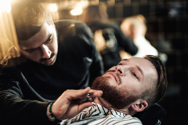 Clienti in barbiere
 - Foto, immagini
