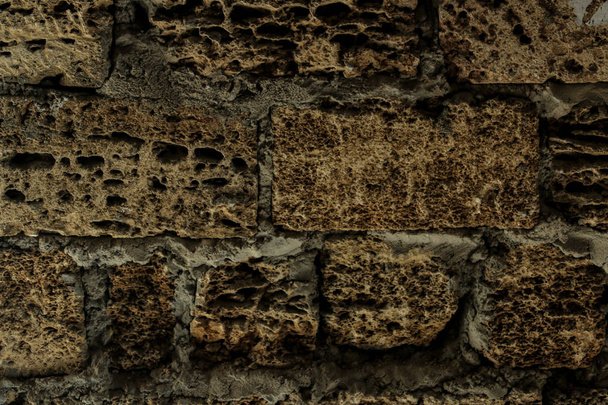текстура из натурального камня. background of shellstone stone stone. каменная стена с цементом
 - Фото, изображение