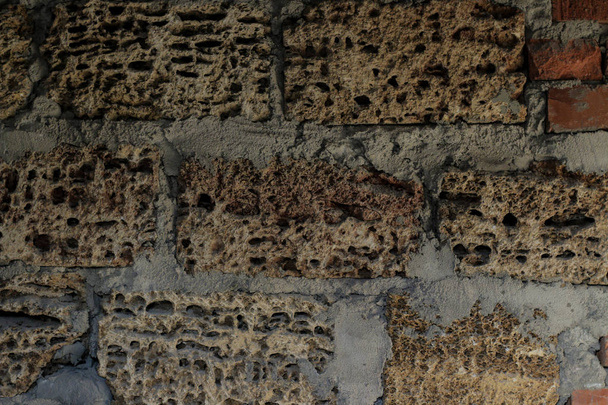 υφή της φυσικής πέτρας. φόντο από πέτρα shellstone. πέτρινο τοίχο με τσιμέντο - Φωτογραφία, εικόνα