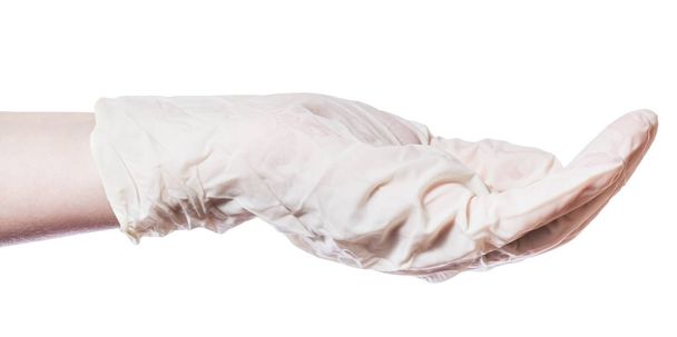 vista lateral del puñado vacío en la palma en guante de látex aislado sobre fondo blanco
 - Foto, Imagen