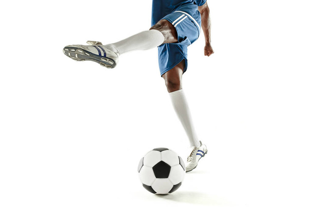 legs of soccer player close-up isolated on white - Valokuva, kuva
