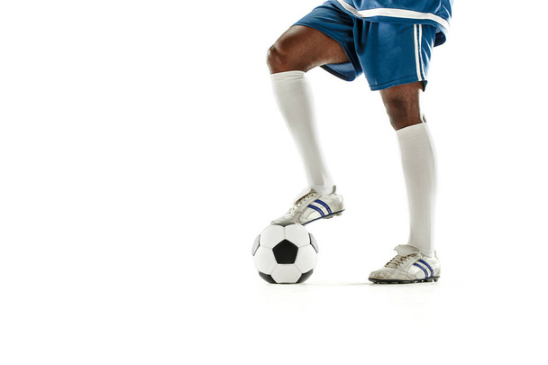 legs of soccer player close-up isolated on white - Fotografie, Obrázek