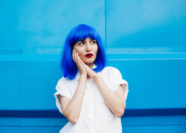 Portrait of a young girl with blue hair - Фото, зображення