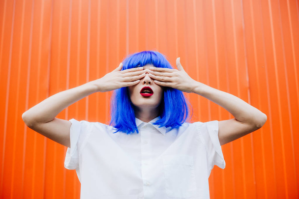 Portrait of a young girl with blue hair - Fotoğraf, Görsel