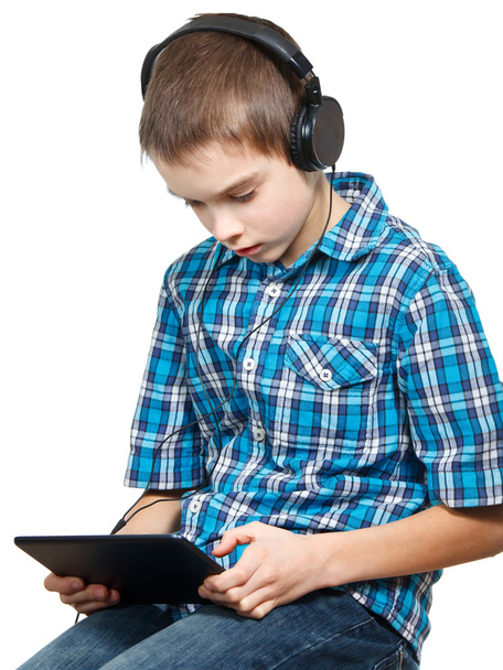 Kid playing with a tablet computer - Foto, immagini
