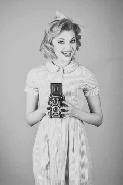 Retro woman with vintage camera. s - Фото, изображение