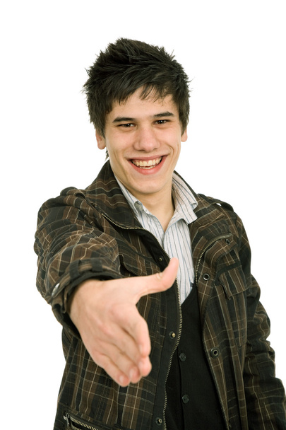 Young casual man offering to shake the hand - Foto, immagini
