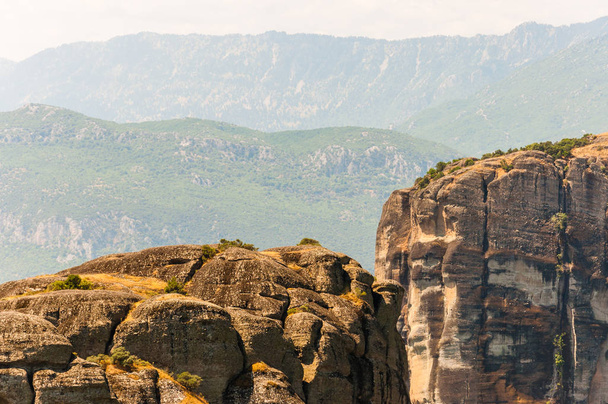 Scenic landscape view on Meteora rock formations cliffs and peaks in Greece - Fotoğraf, Görsel