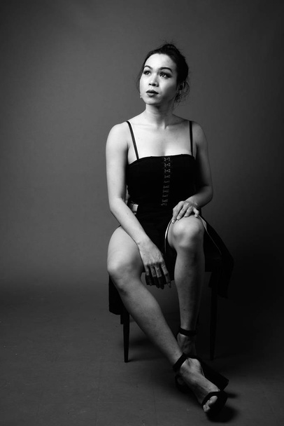 Young beautiful Asian transgender woman in black and white - Fotografie, Obrázek