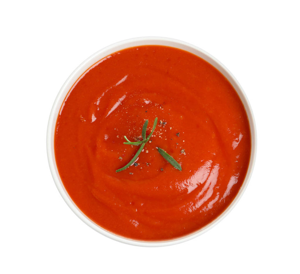 Bowl with fresh homemade tomato soup on white background, top view - Fotó, kép