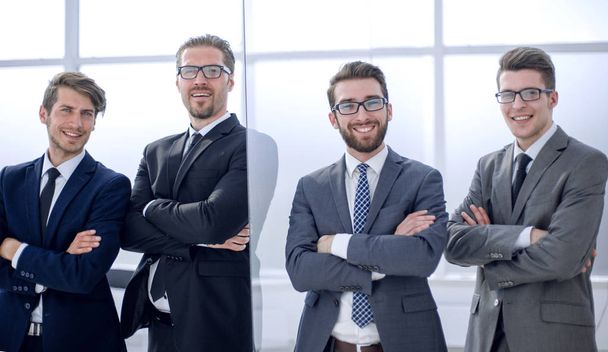 group of confident business people standing in the office - Photo, Image